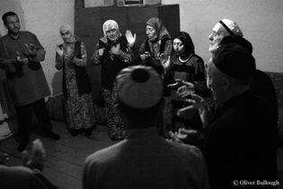 Chechen villagers conducting a prayer ritual in the Kazakhstan village<br /> of Krasnaya Polyana  -  photo copyright Oliver Bullough