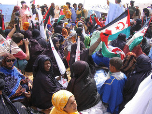 Sahrawi women protesting against the Moroccan occupation.  Photo by Saharauiak