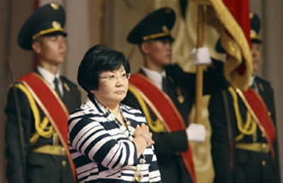 Roza Otunbayeva being sworn in as President in 2010