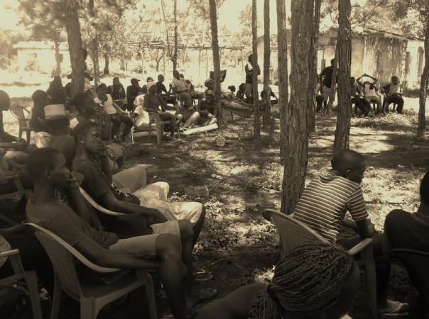 Garífuna meet during their ongoing Defense of the Land campaign. Here they have occupied land taken from them in the village of Vallecito. Photo by OFRANEH.