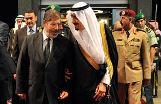 Egyptian President, Mohamed Morsi walks with Saudi Crown Prince Salman bin Abdulaziz Al Saud, 