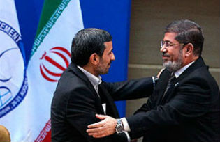 Mahmoud Ahmadinejad, President of the Islamic Republic of Iran and Mohammed Morsi, President of Egypt