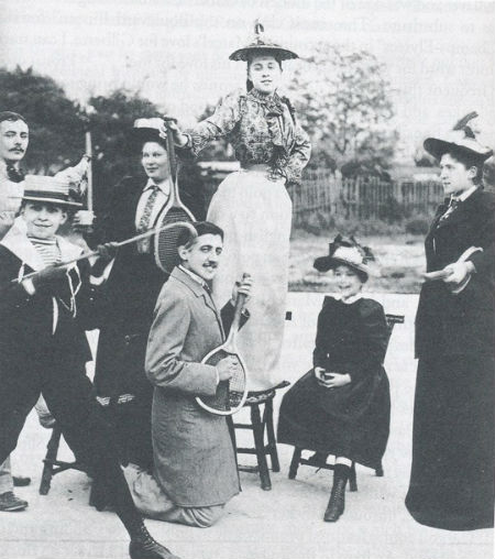 A 20 year old Proust posing with a tennis racket (playing the world’s first air guitar?) in 1891