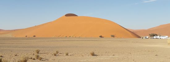 Red sand dunes in the Namibian desert. Photo by Olga Jazzarelli