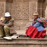 Sitting on the cathedral steps in Cuzco, Peru. Photo © Gianni Bernacchia