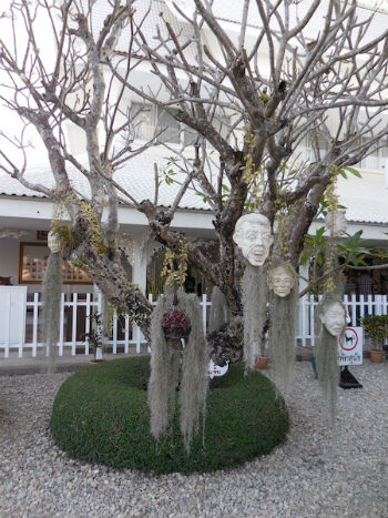 Hanging heads at the White Temple