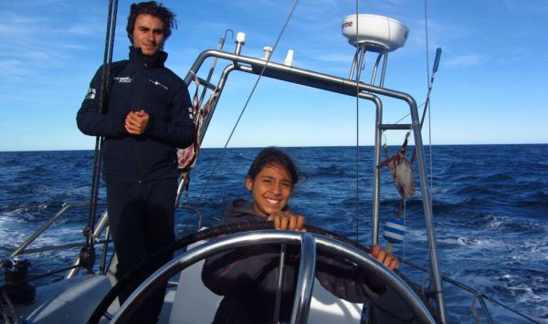 Ghita and Livio at the helm. Photo by Marco Alberti